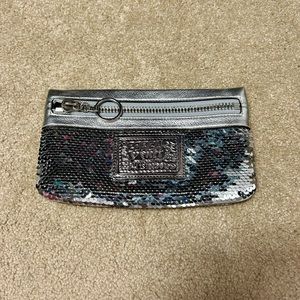Coach silver leather and sequin zipper clutch new without tags